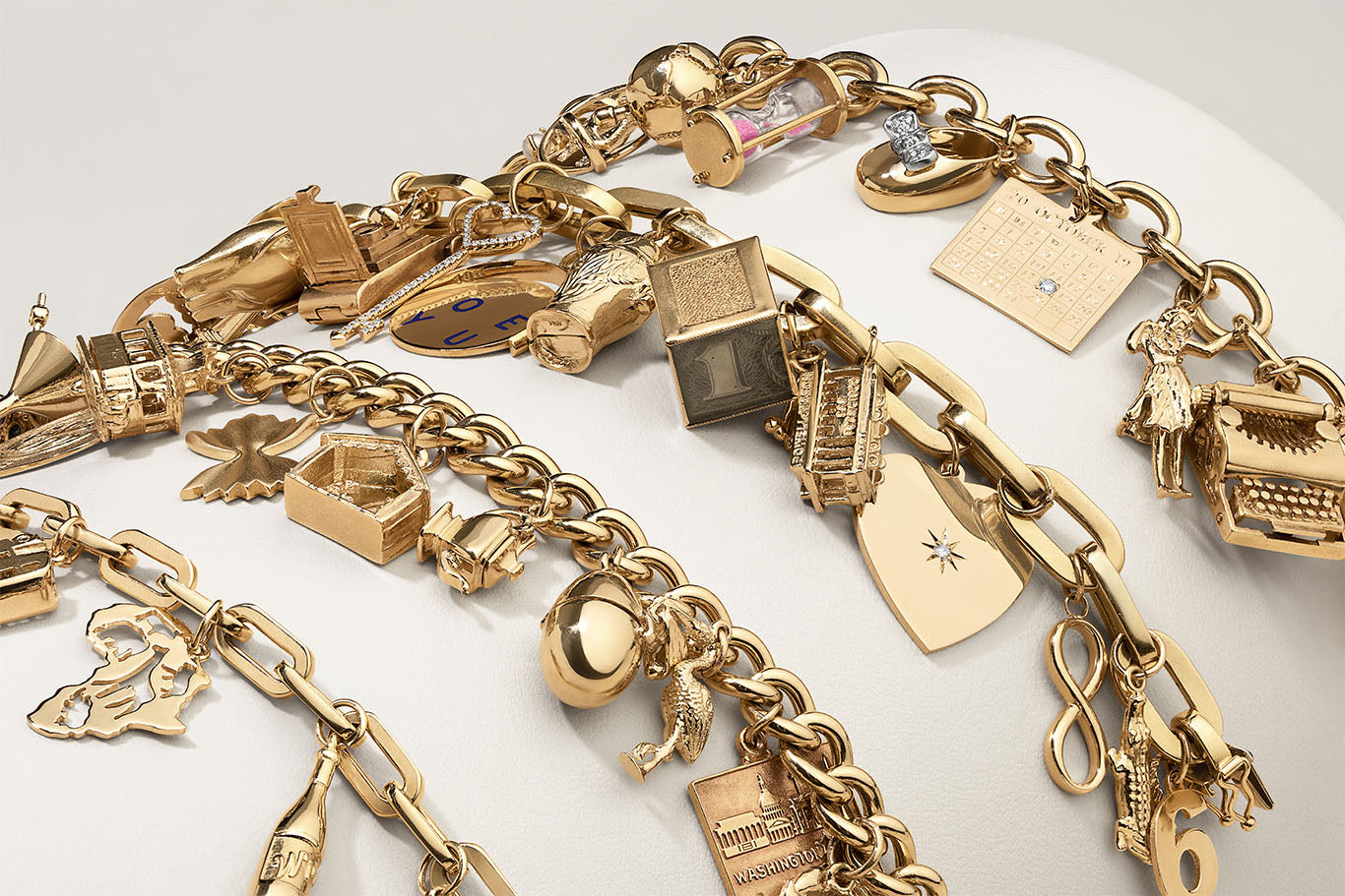 close up of unique, personalized charm bracelets